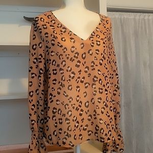 Is darling animal print blouse